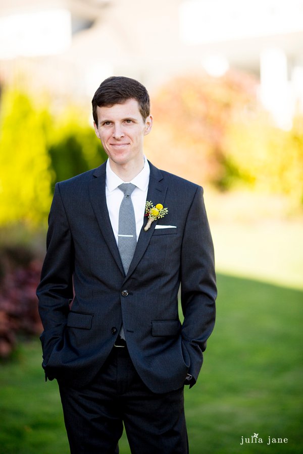groom at the water's edge